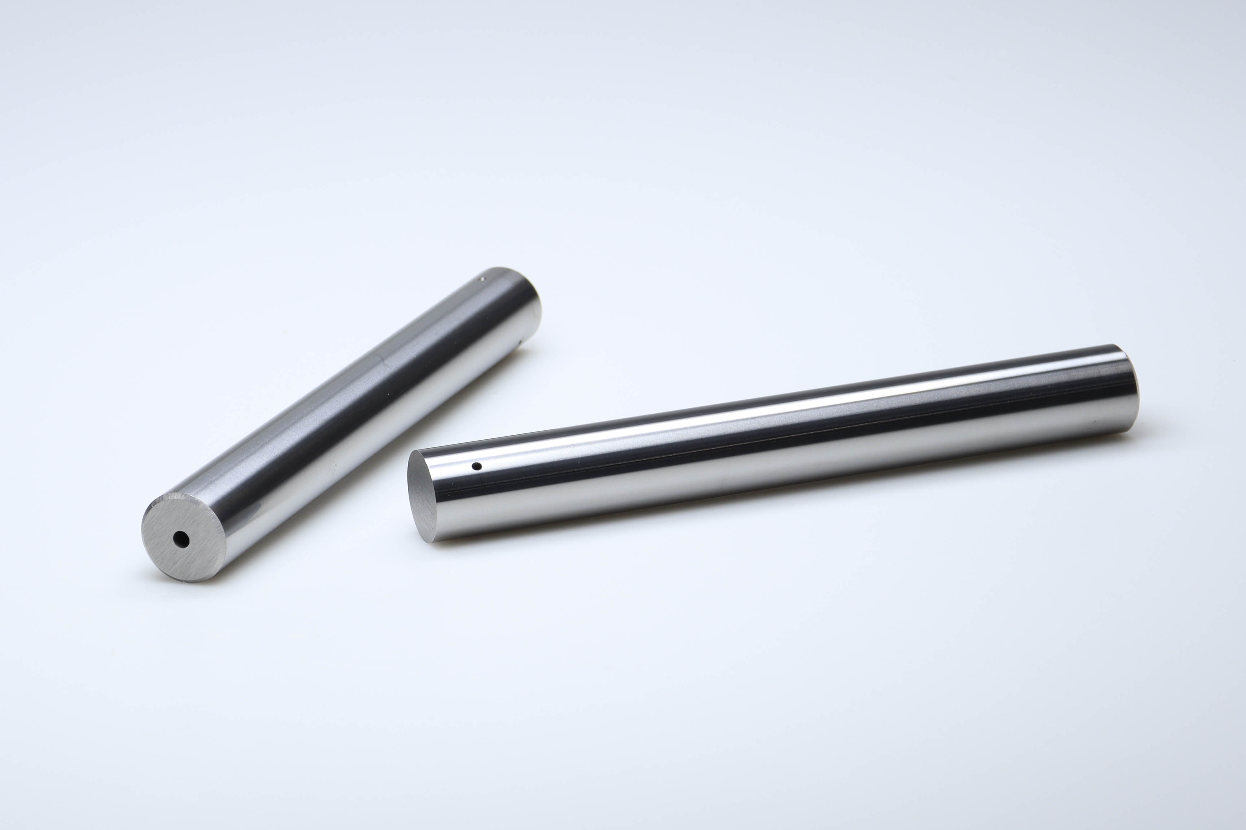 Une barre de carbure avec 1 trou d'arrosage central et plusiers sorties en Y