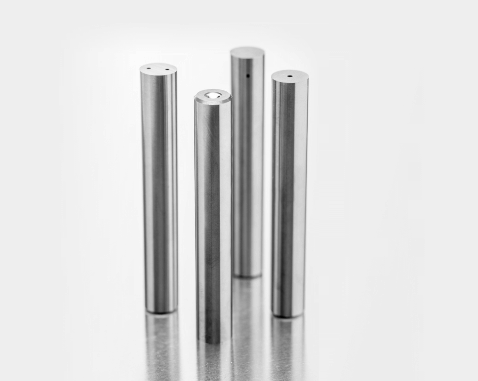 Multiple carbide rods with different types of coolant holes